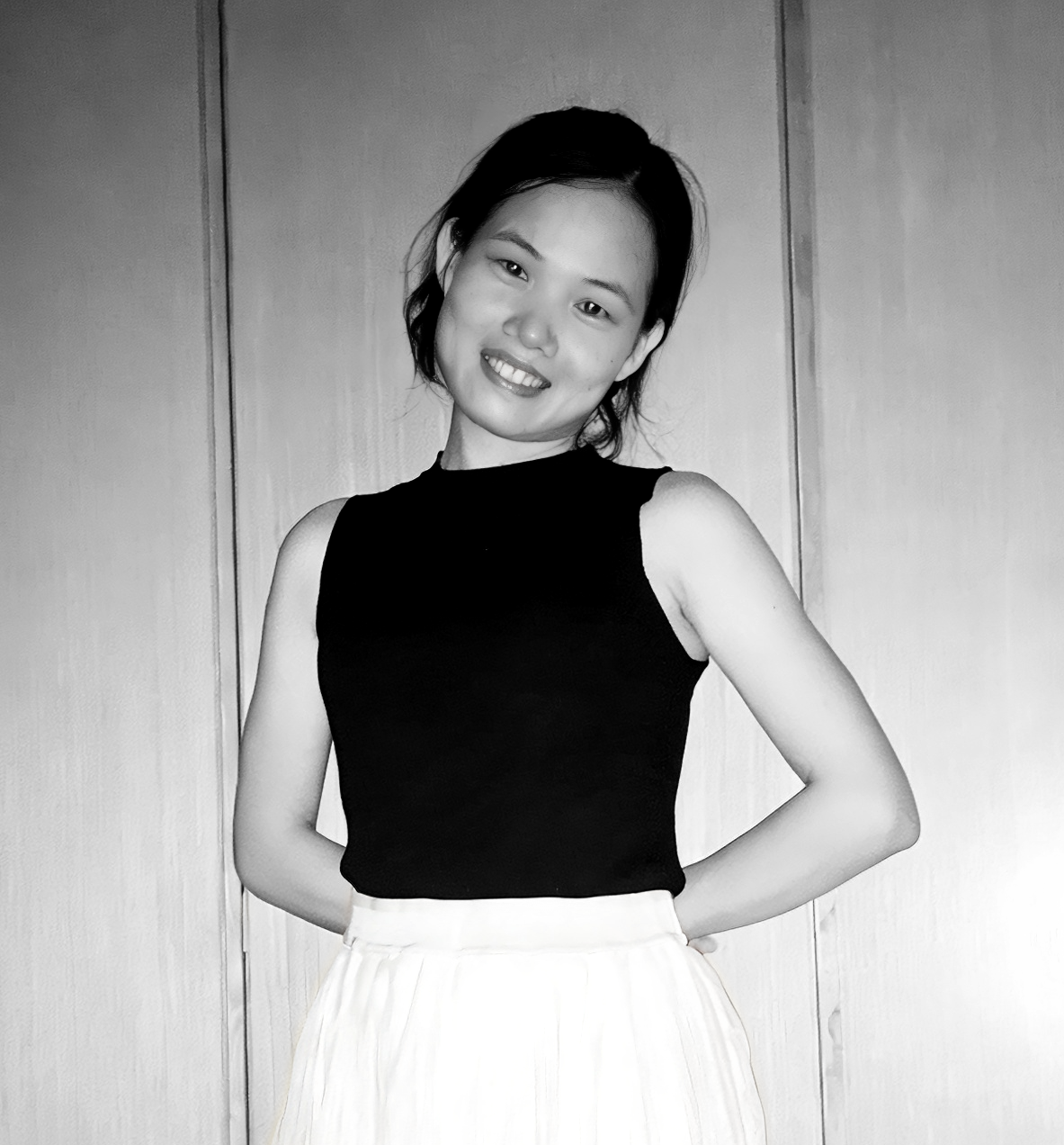 Forty year old male executive in dark suit and tie, professional headshot with confident expression and corporate background